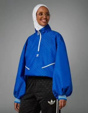 ADIDAS CORTAVIENTOS ADICOLOR 70S HALFZIP MONOGRAM