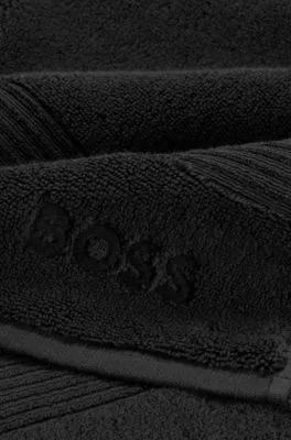 Alfombrilla de baño negra de algodón del Egeo con logo tonal